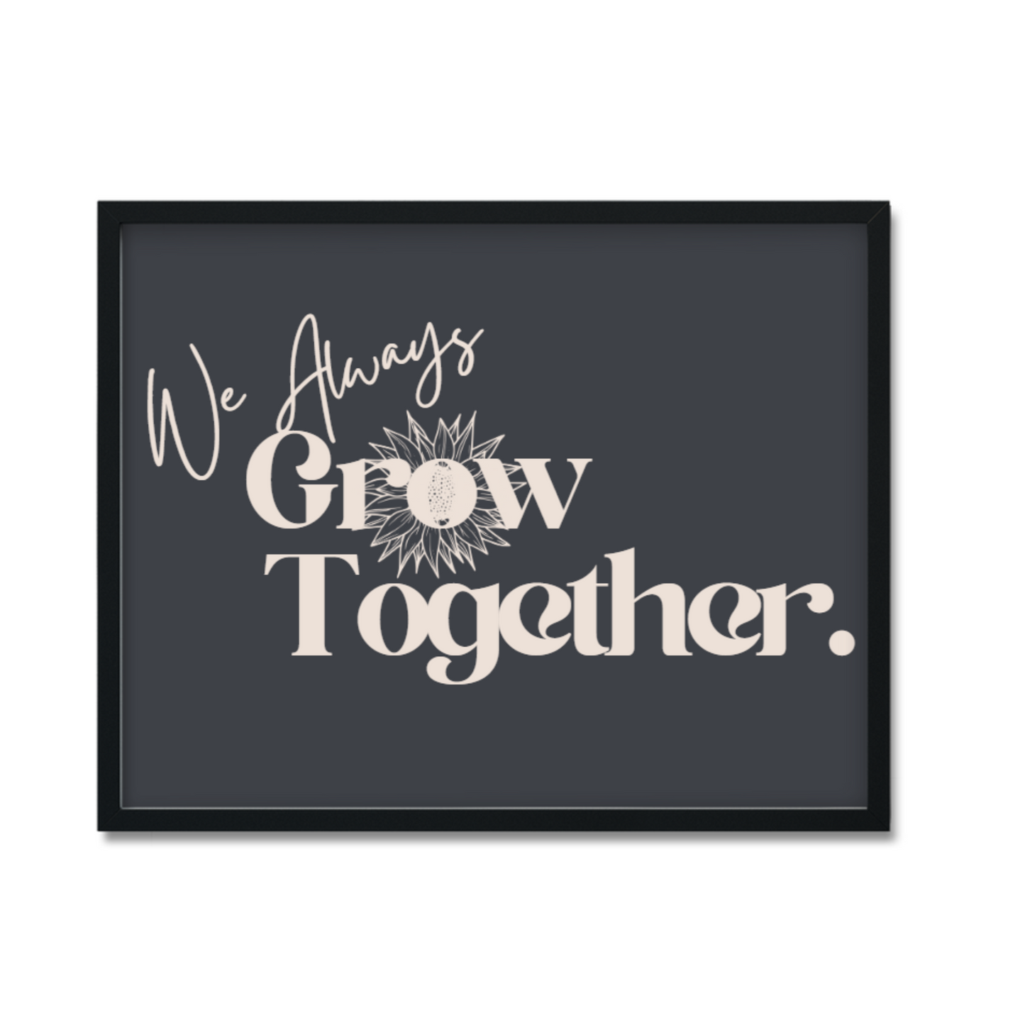 Black framed artwork with the words We Always Grow Together