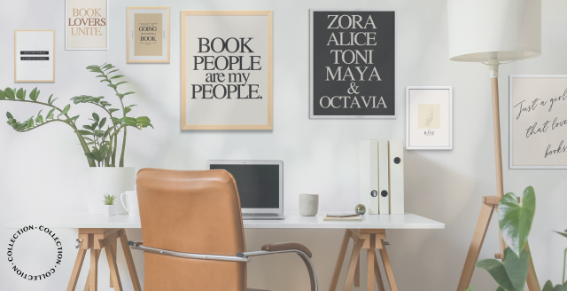 Image of a desk with a plant and laptop on it against a wall adorned with framed images from the El and Al Co. Book Lovers Unite Collection 