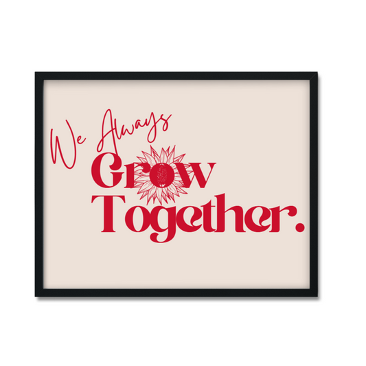Image of black framed artwork with text We Always Grow Together 